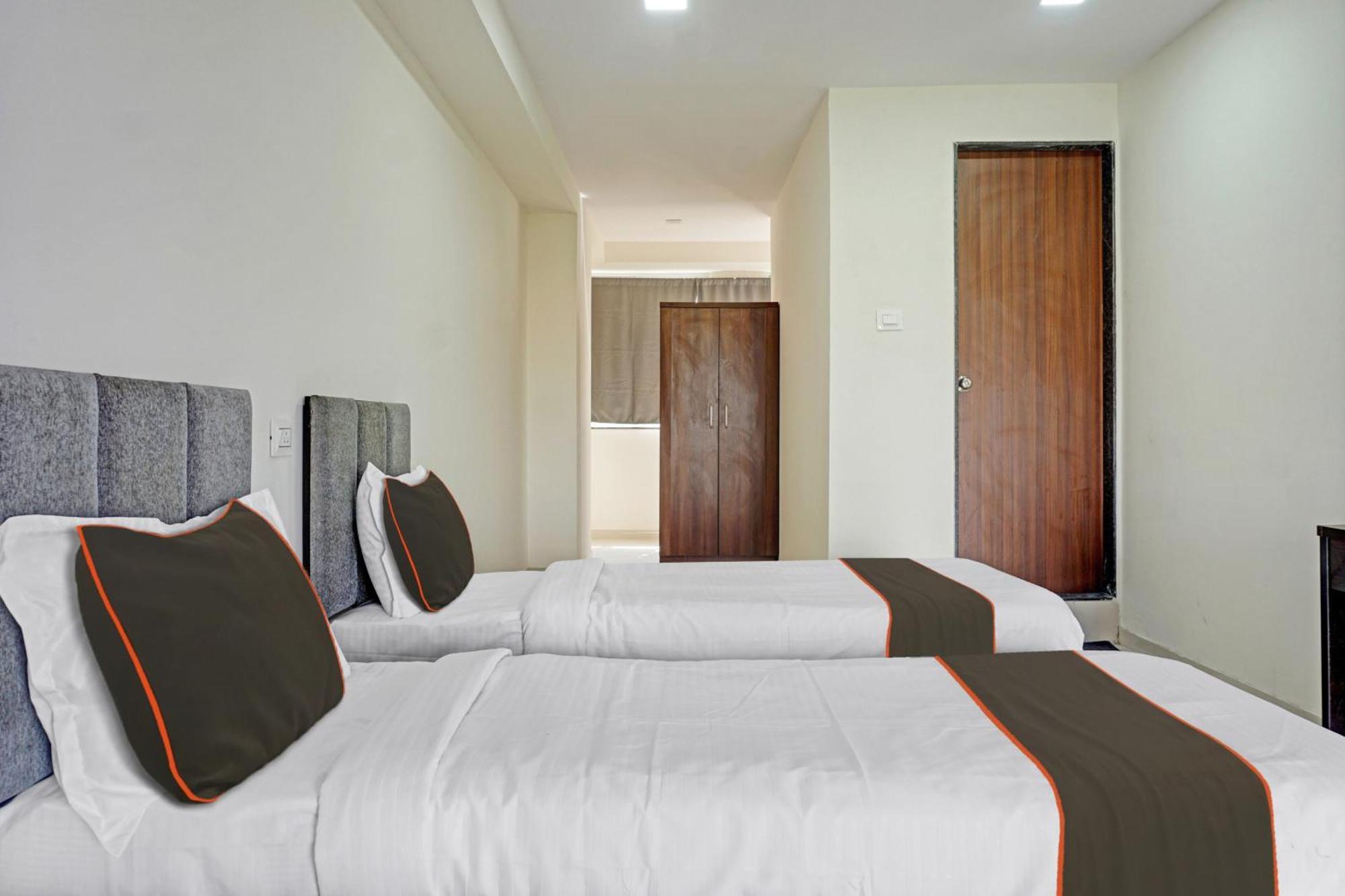 Super Collection O Rk Inn Chinchvad Bagian luar foto